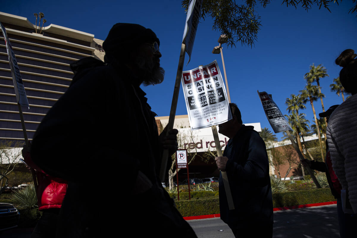 Culinary Workers Union Local 226 members picket outside of Station Casinos headquarters on Thur ...