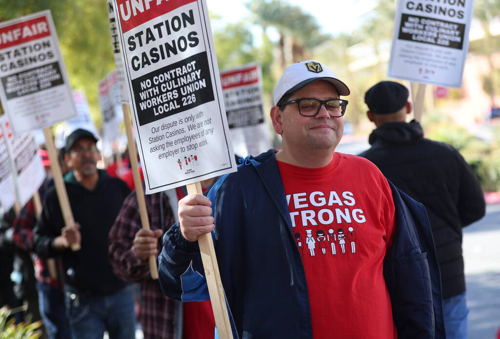 Culinary Local 226 member Adam Christian pickets outside of Station Casinos headquarters on Thu ...