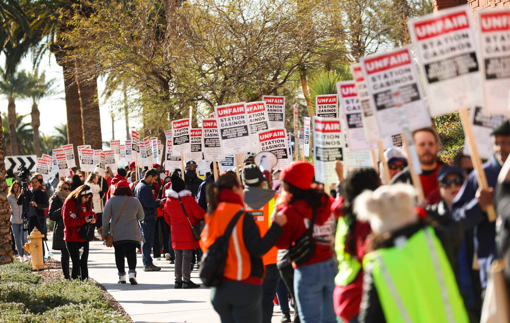Culinary Local 226 members picket outside of Station Casinos headquarters on Thursday, Jan. 19, ...