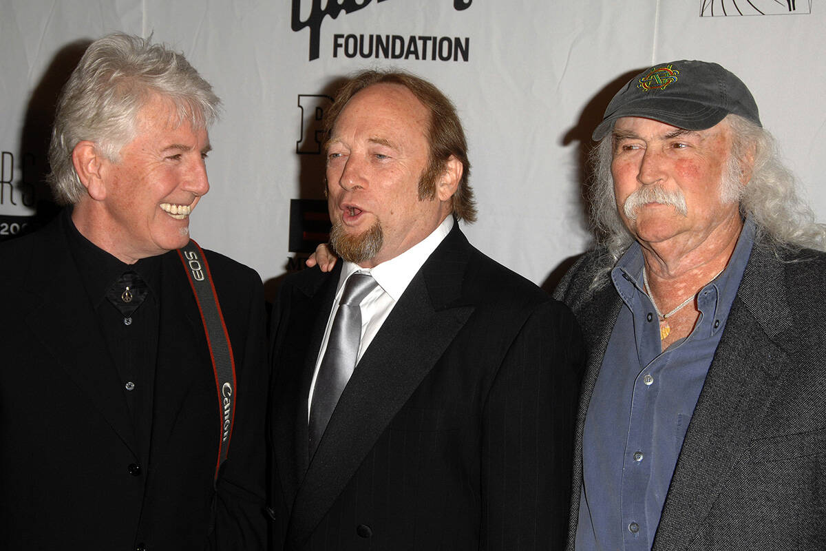 Musicians Graham Nash left, Stephen Stills and David Crosby, right, attend the 40th annual Song ...