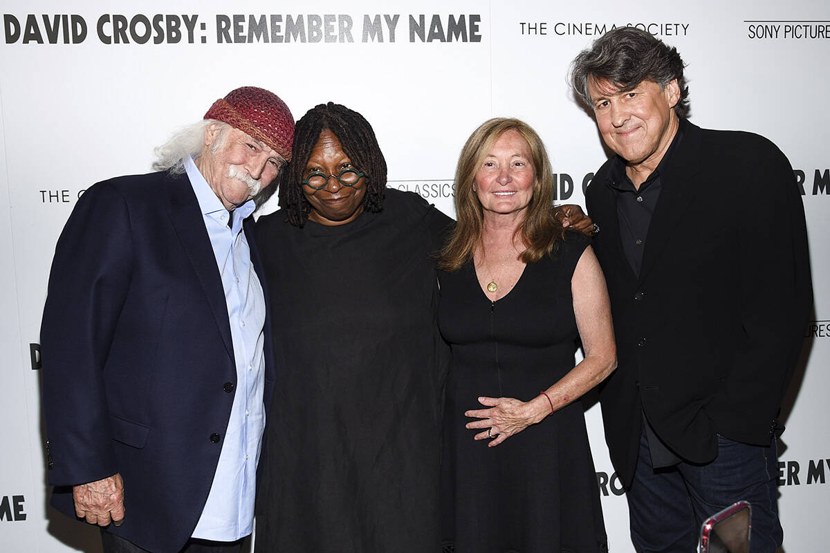 Musician David Crosby, left, and wife Jan Dance pose with actress Whoopi Goldberg, center, and ...