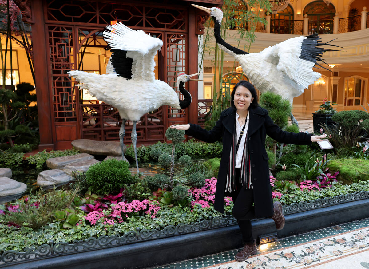 Mary Tran of Houston poses in the Year of the Rabbit display celebrating Lunar New Year at the ...