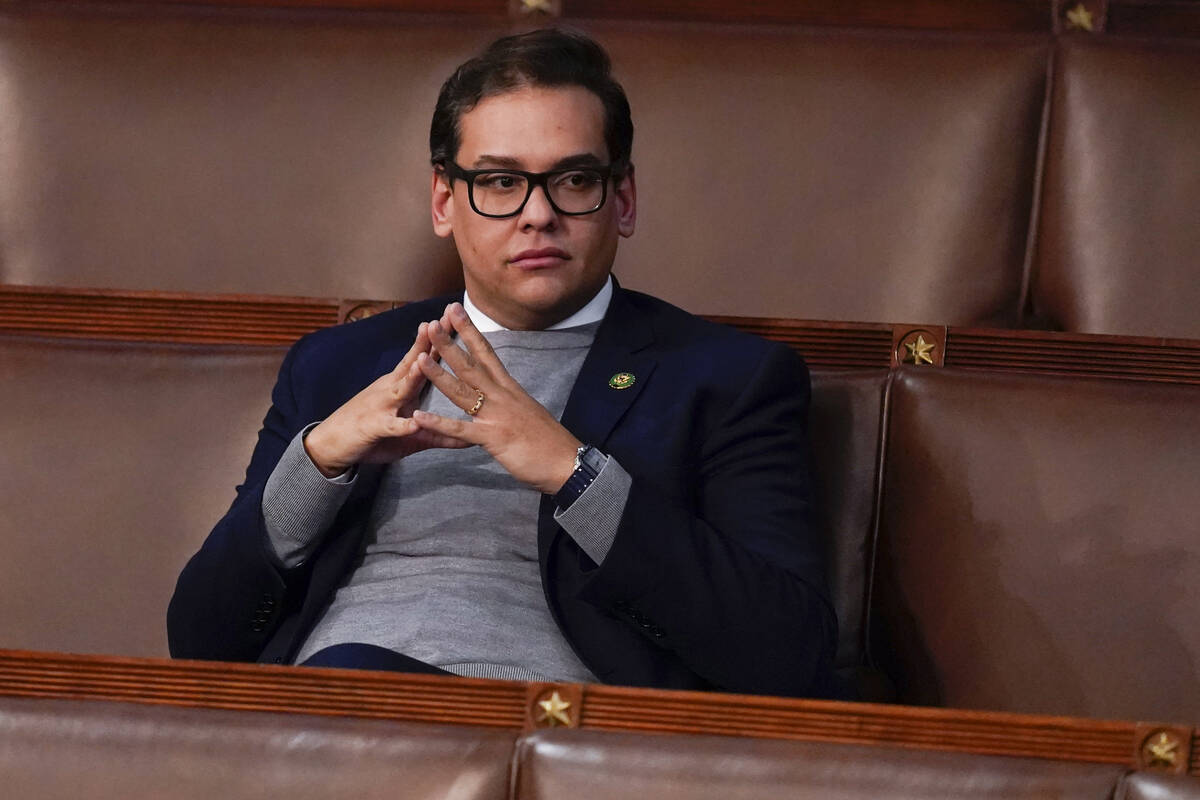 Rep. George Santos, R-N.Y., waits for the start of a session in the House chamber as the House ...