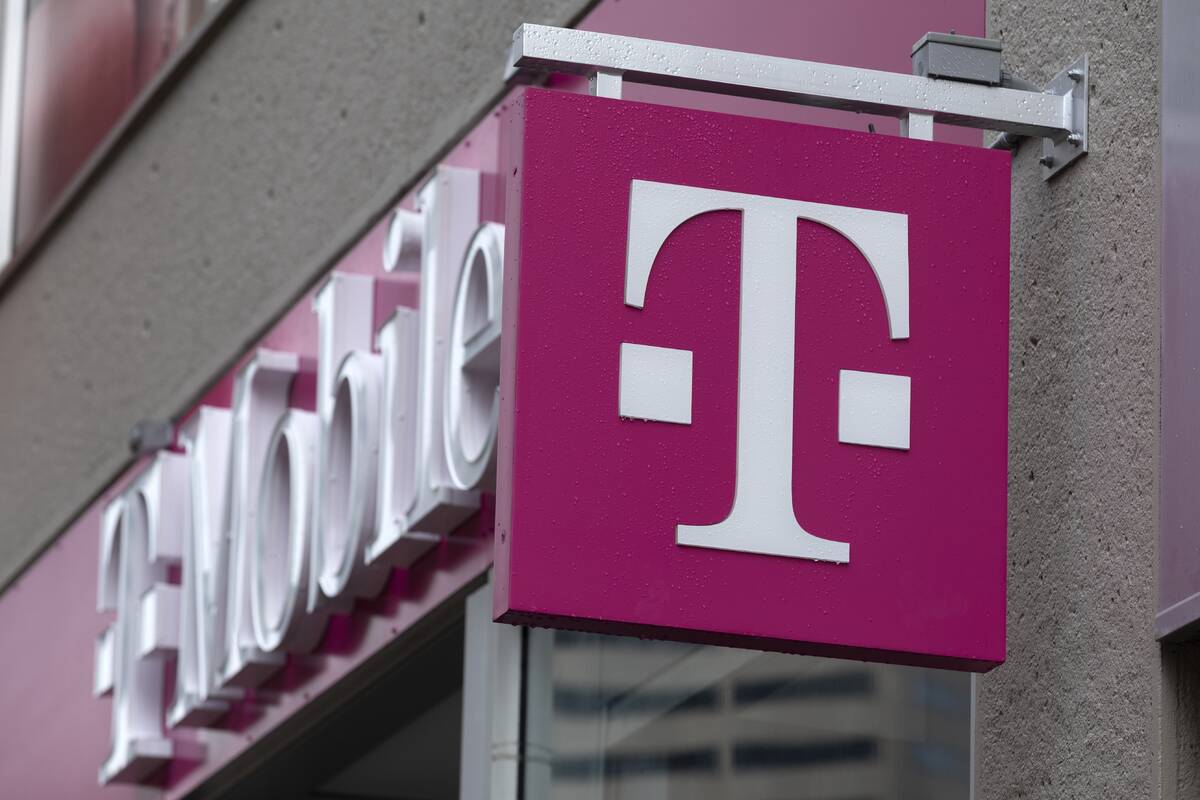 FILE - The T-Mobile logo is seen on a storefront, Oct. 14, 2022, in Boston. The U.S. wireless c ...