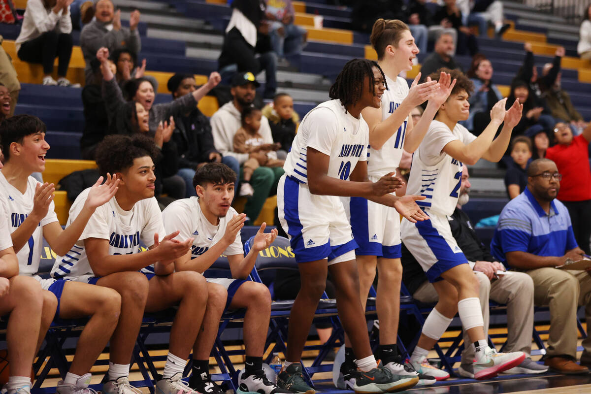 The Sierra Vista bench reacts after a play during a boy's basketball game against Spring Valley ...