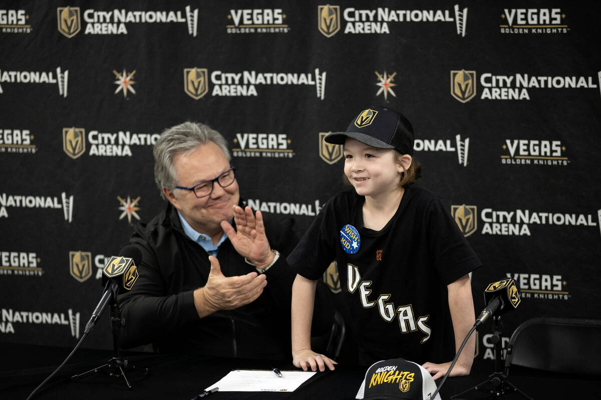 Annabelle Hanson of Janesville, Calif., 8, accepts applause from media and Golden Knights gener ...