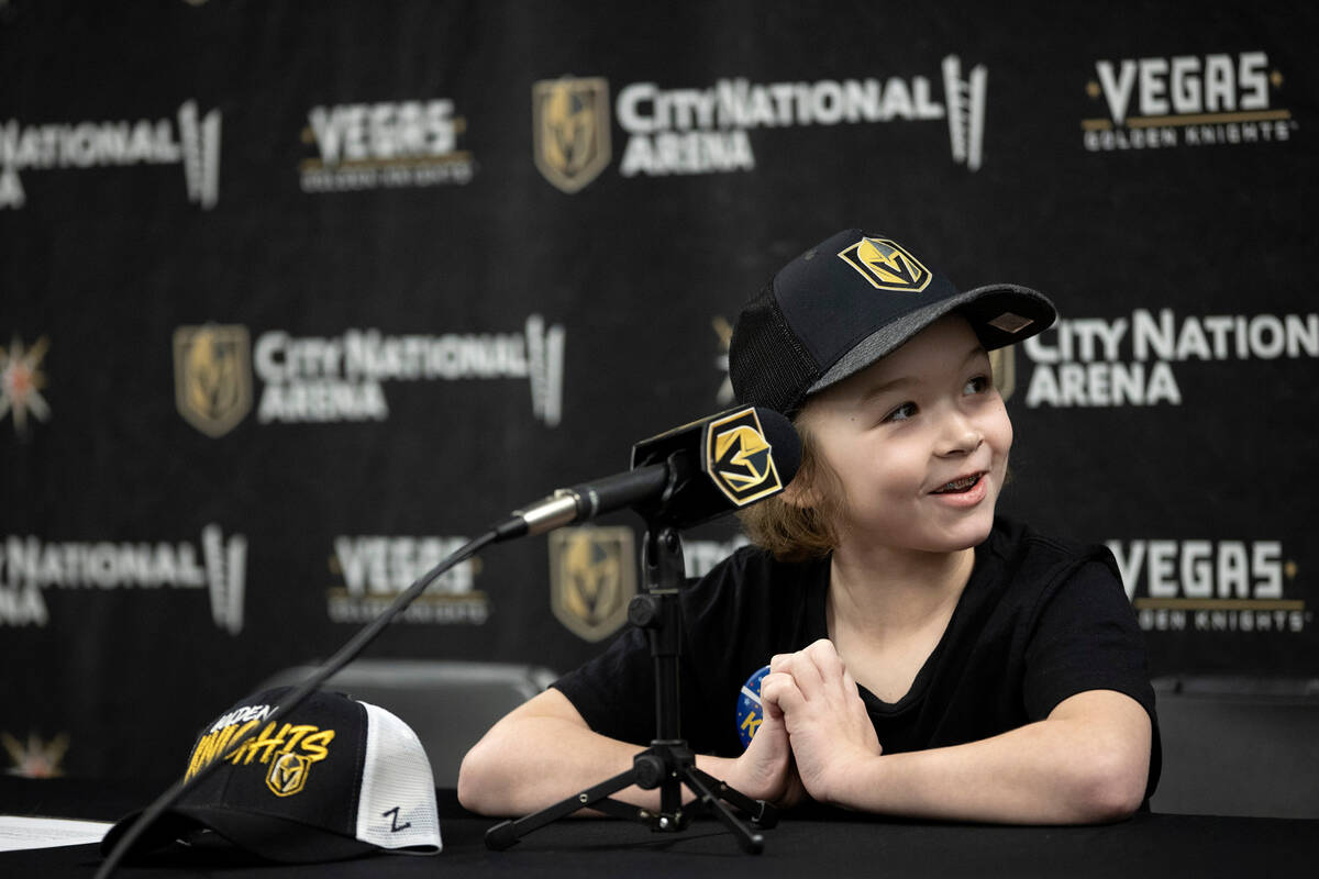 Annabelle Hanson, 8, smiles before signing her Golden Knights contract at City National Arena o ...