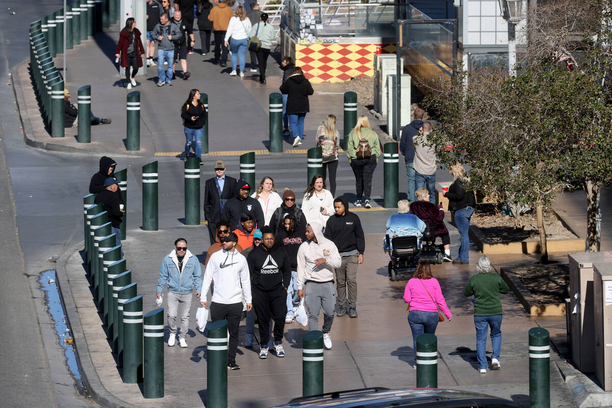 Pedestrians walk on the south Strip in Las Vegas Friday, Jan. 20, 2023. (K.M. Cannon/Las Vegas ...