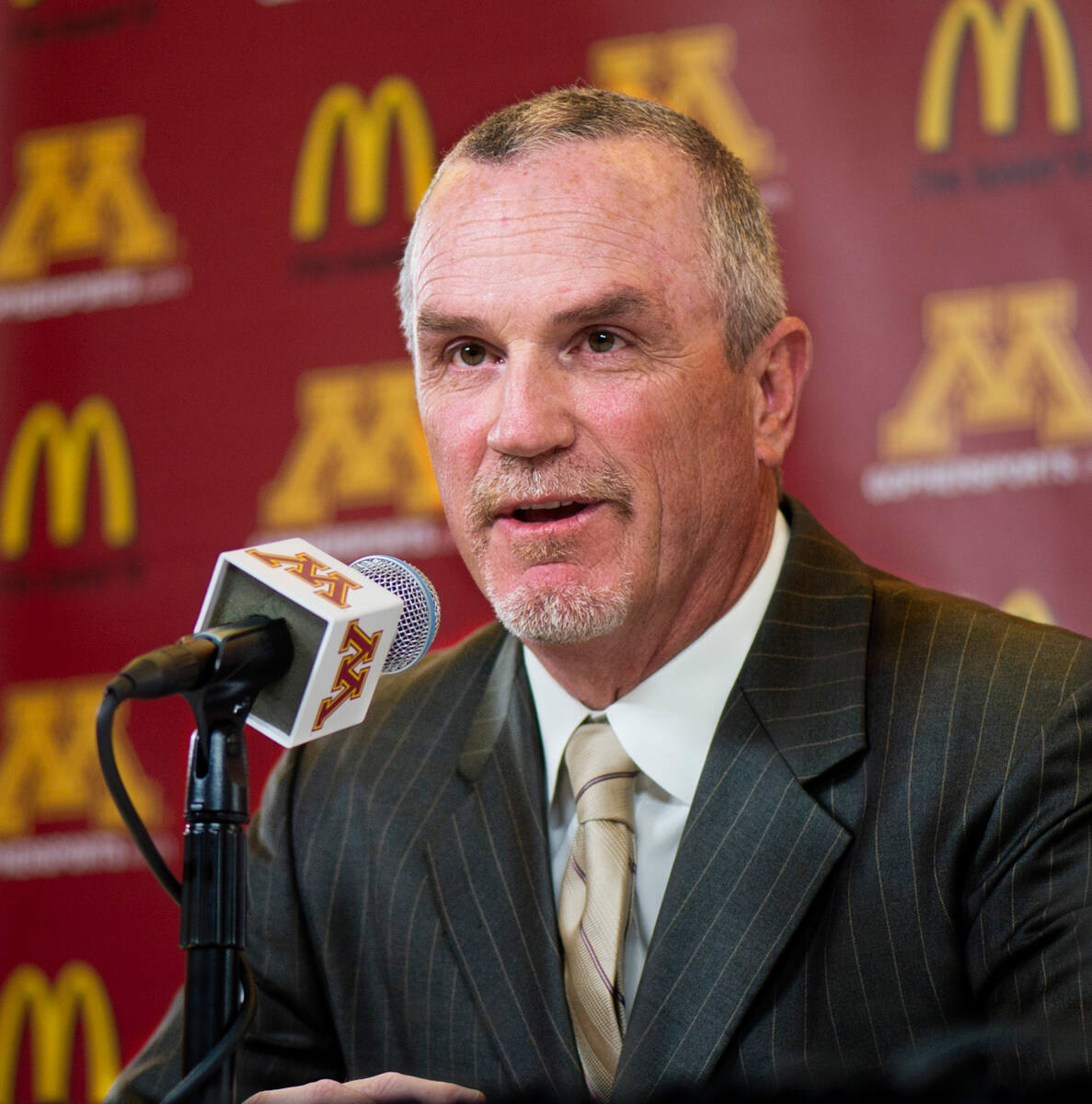 Minnesota offensive coordinator Jeff Horton speaks during a news conference where it was announ ...