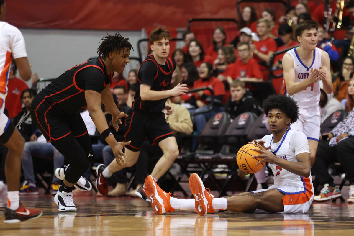 Bishop Gorman's Keenan Bey (2) grabs a loose ball before his team called a timeout during the s ...