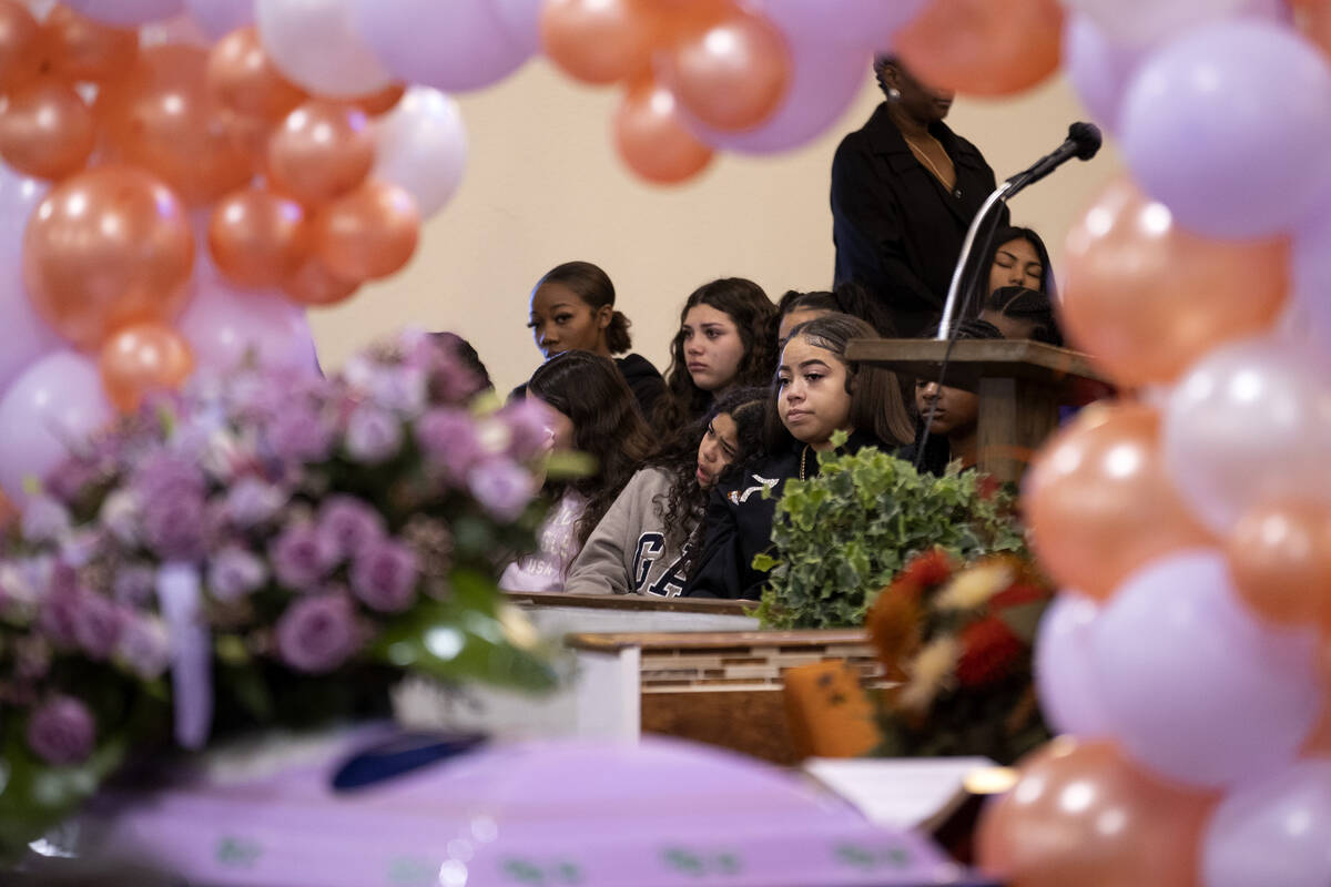 Classmates and friends of Ashari Hughes are seated in a special section during a memorial at Ne ...