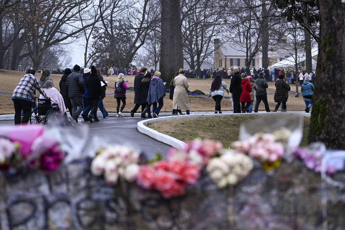 People arrive at Graceland for a memorial service for Lisa Marie Presley Sunday, Jan. 22, 2023, ...