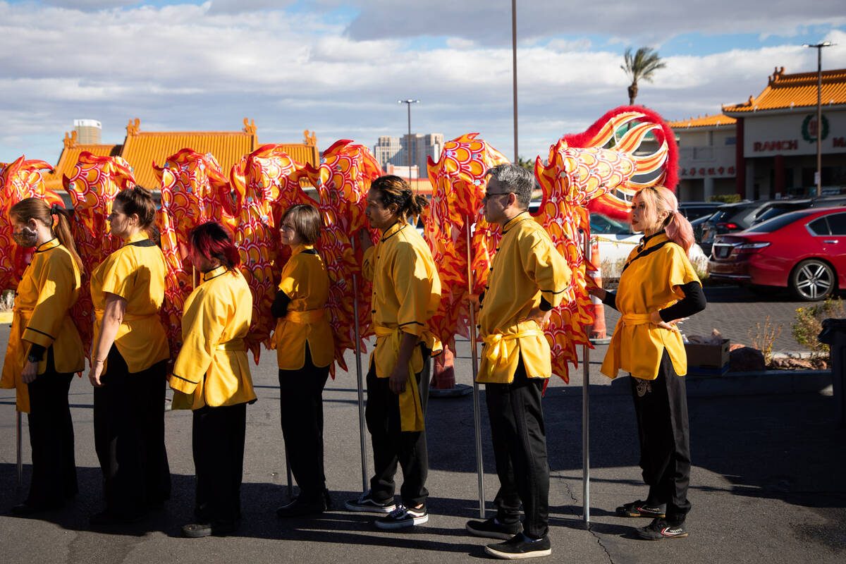 Lion dancers during a Chinese New Year celebration at the Chinatown Plaza on Sunday, Jan. 22, 2 ...