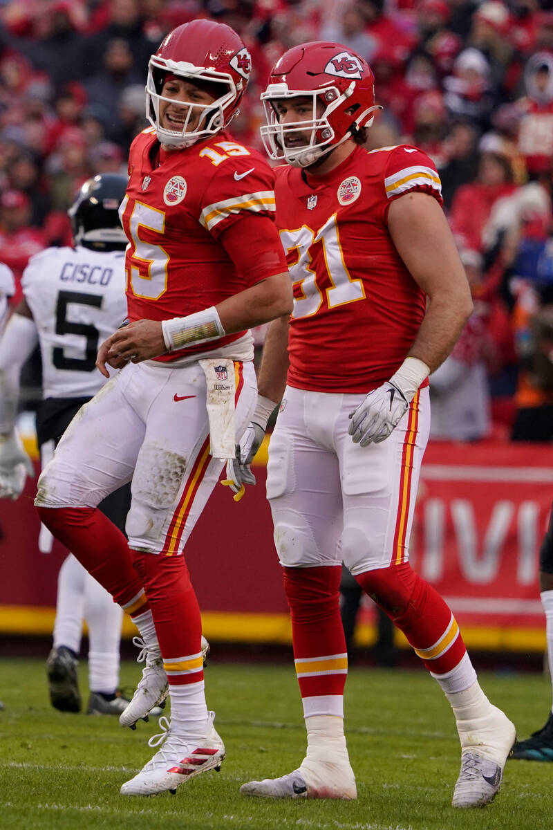 Kansas City Chiefs quarterback Patrick Mahomes (15) limps after an injury during the first half ...