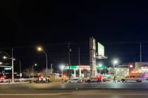 Police investigate a fatal shooting outside a gas station at Boulder Highway and Russell Road o ...