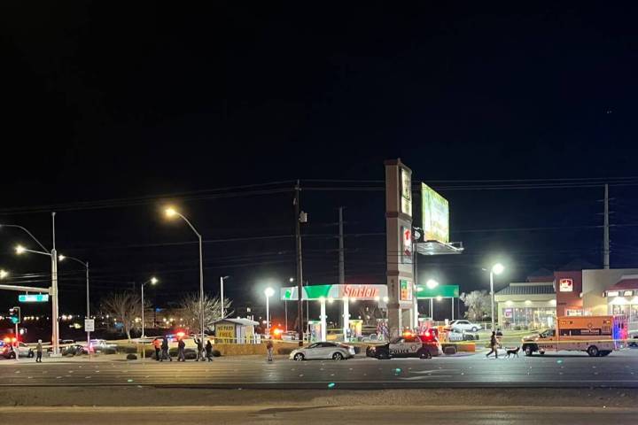 Police investigate a fatal shooting outside a gas station at Boulder Highway and Russell Road o ...