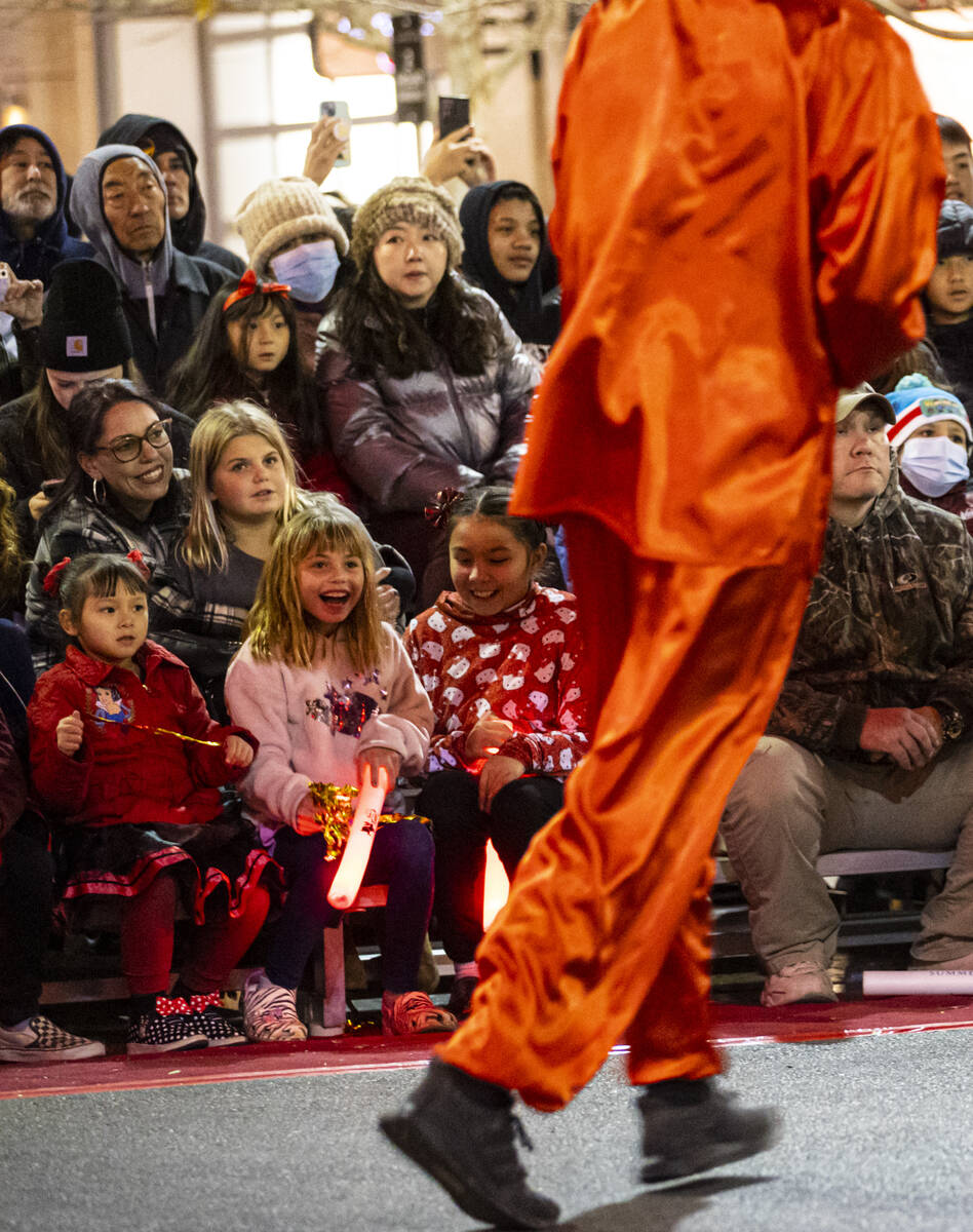 Attendees watch Downtown Summerlin's Lunar New Year Parade on Sunday, Jan. 22, 2023, in Summerl ...