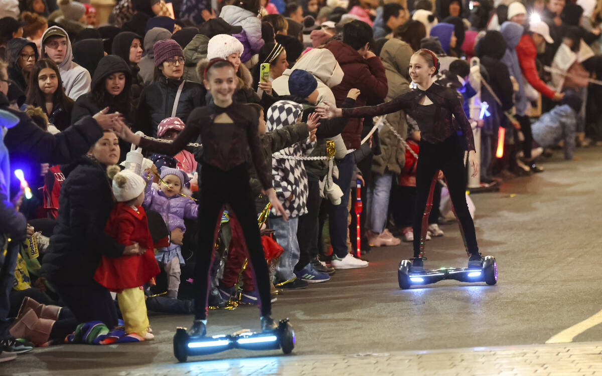 Members of K-Star Training Academy ride on hoverboards during Downtown Summerlin's Lunar New Y ...