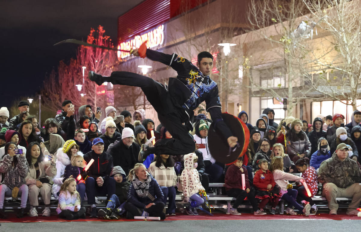 Members of K-Star Training Academy perform during Downtown Summerlin's Lunar New Year Parade on ...