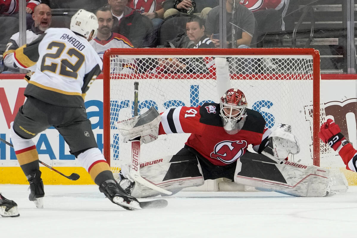 New Jersey Devils goaltender Vitek Vanecek (41) tends the net against Vegas Golden Knights righ ...