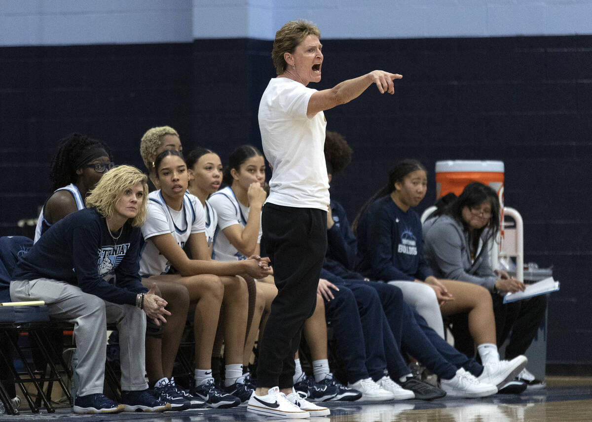 Centennial head coach Karen Weitz shouts from the sidelines during a girls high school basketba ...