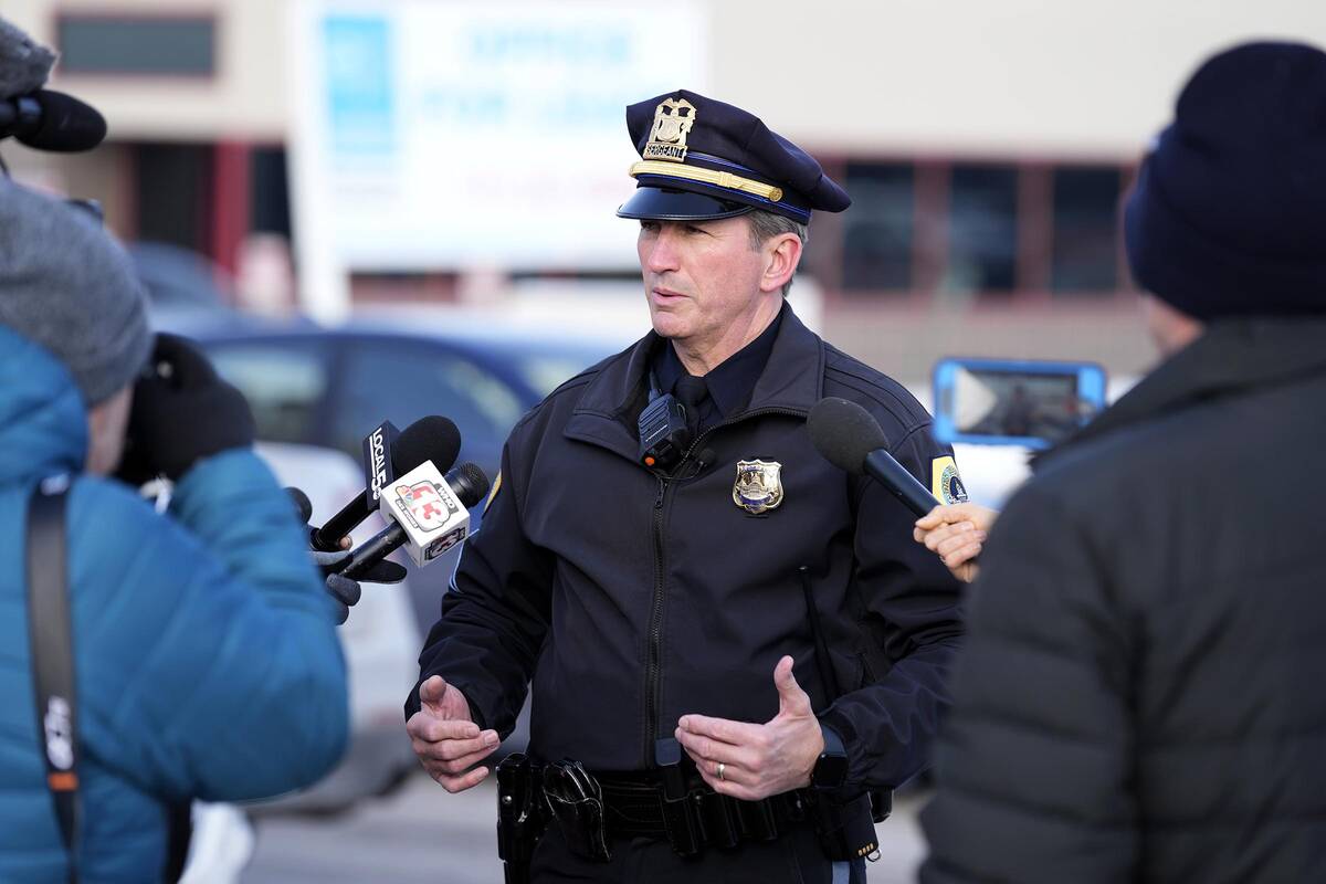 Des Moines Police spokesman Sgt. Paul Parizek speaks outside the Starts Right Here building, Mo ...