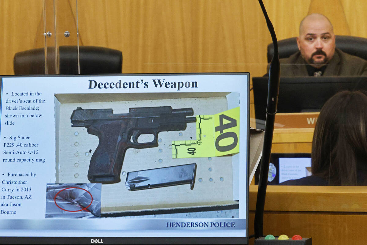 An image of Jason Bourne’s weapon is shown while Henderson police detective Richard Chri ...