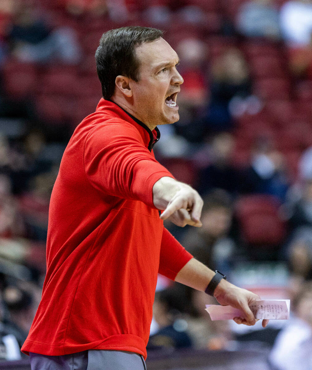 UNLV Head Coach Kevin Kruger directs his players against Wyoming during the second half of thei ...