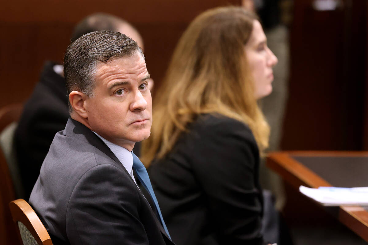 Matthew Christian, an attorney representing the Metropolitan Police Department, listens to argu ...