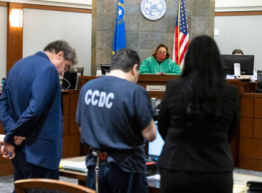 Bramwell Retana, center, a pastor who has pleaded guilty to child sexual assault charges addres ...