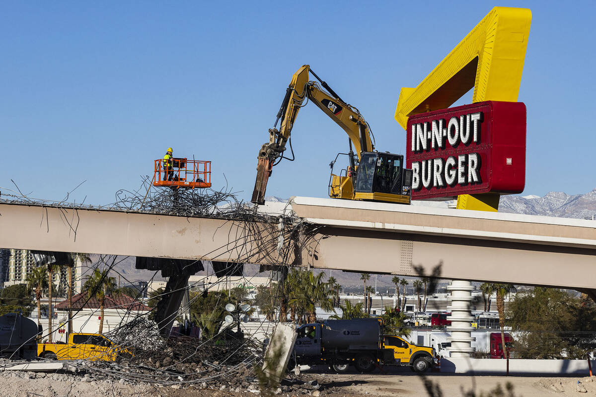 The Tropical Avenue exit is closed as workers demolish the bridge, on Wednesday, Jan. 18, 2023, ...