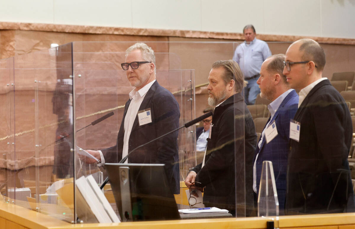 Aaron Neubert of Aaron Neubert Architects and studioSTIGSGAARD, left, speaks, Wednesday, Jan. 2 ...