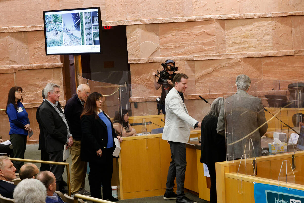 Paul Murdoch Architects team makes a presentation, Wednesday, Jan. 25, 2023, during a meeting o ...
