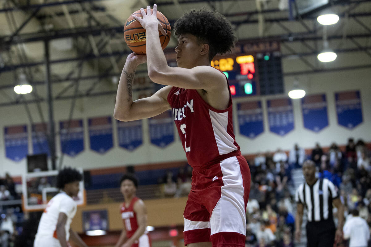 Liberty’s Angelo Kambala (2) prepares to shoots a three-pointer during a Class 5A boys h ...