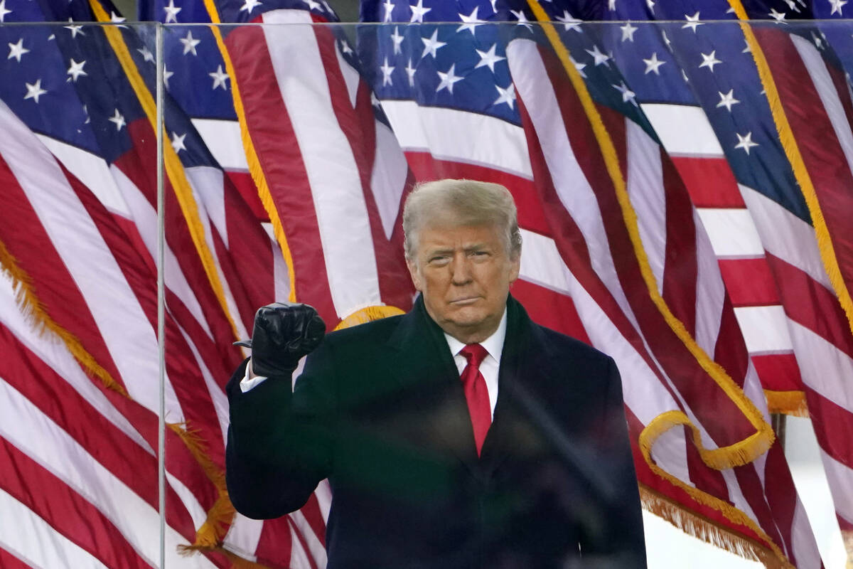 President Donald Trump gestures as he arrives to speak at a rally on Jan. 6, 2021, in Washingto ...