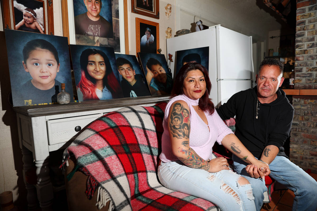 Erlinda Zacarias, left, and husband Jesus Mejia-Santana, pose for a portrait at their North Las ...