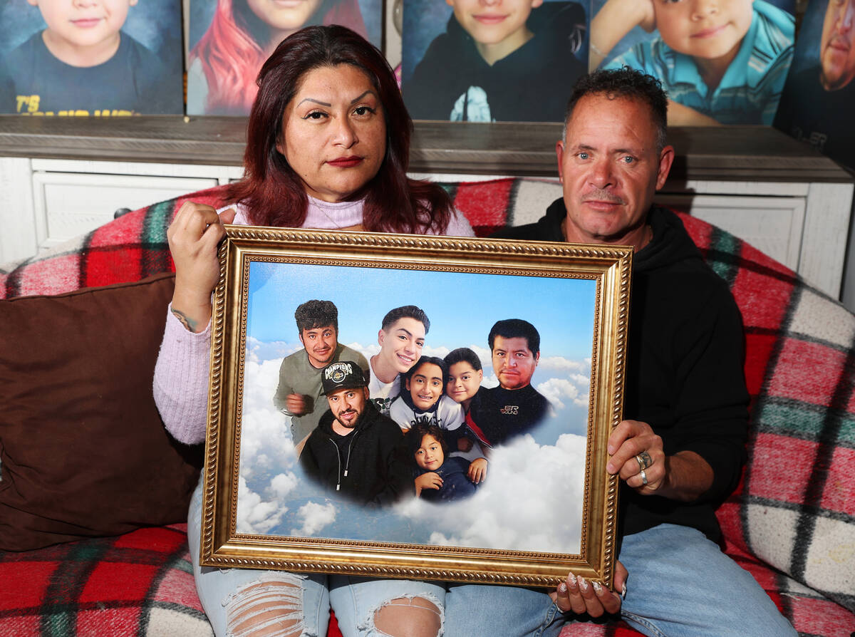 Erlinda Zacarias, left, and husband Jesus Mejia-Santana, pose for a portrait at their North Las ...
