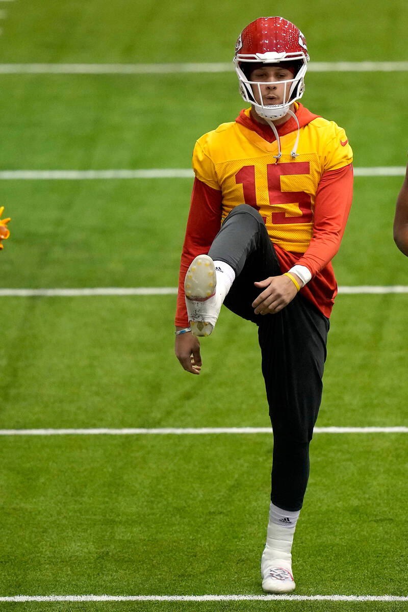 Kansas City Chiefs quarterback Patrick Mahomes stretches runs during an NFL football workout Th ...