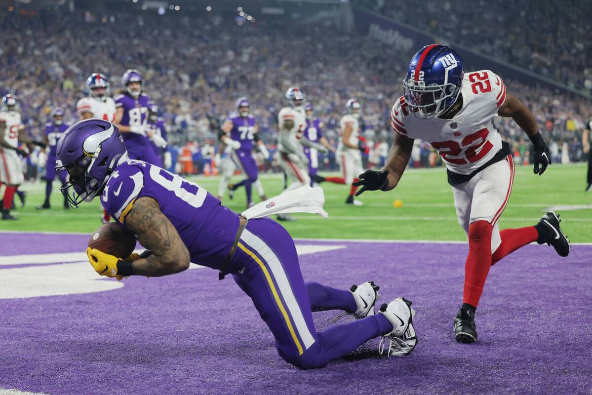 Minnesota Vikings tight end Irv Smith Jr. (84) scores a touchdown against New York Giants corne ...
