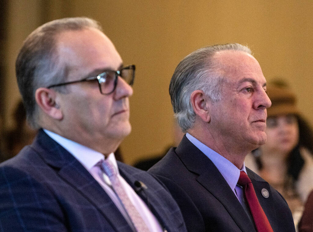 Clark County School District Superintendent Jesus F. Jara, left, and Gov. Joe Lombardo listen t ...