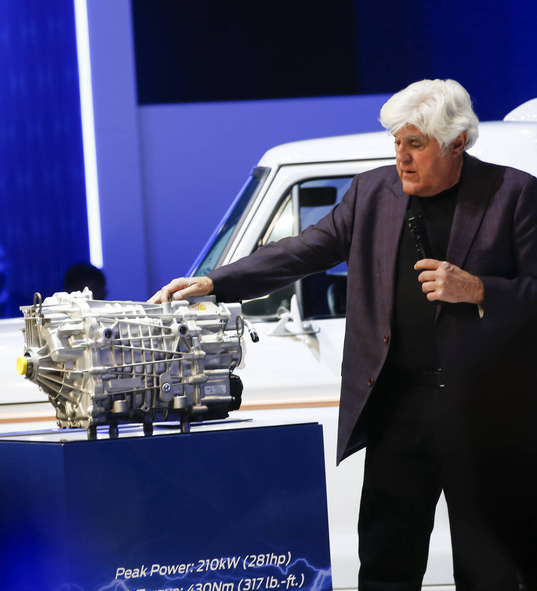 Jay Leno checks out the Eluminator electric crate motor during the Specialty Equipment Market A ...