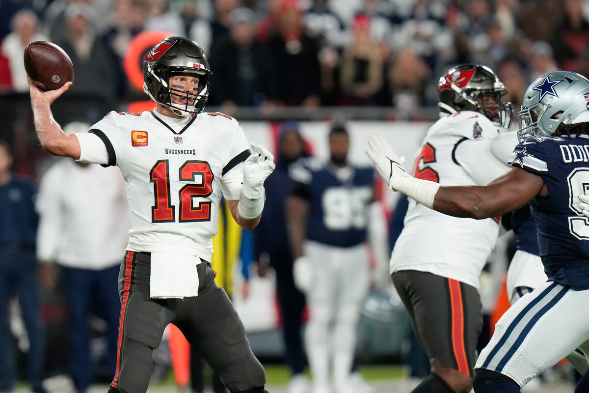 Tampa Bay Buccaneers quarterback Tom Brady (12) works in the pocket against the Dallas Cowboys ...