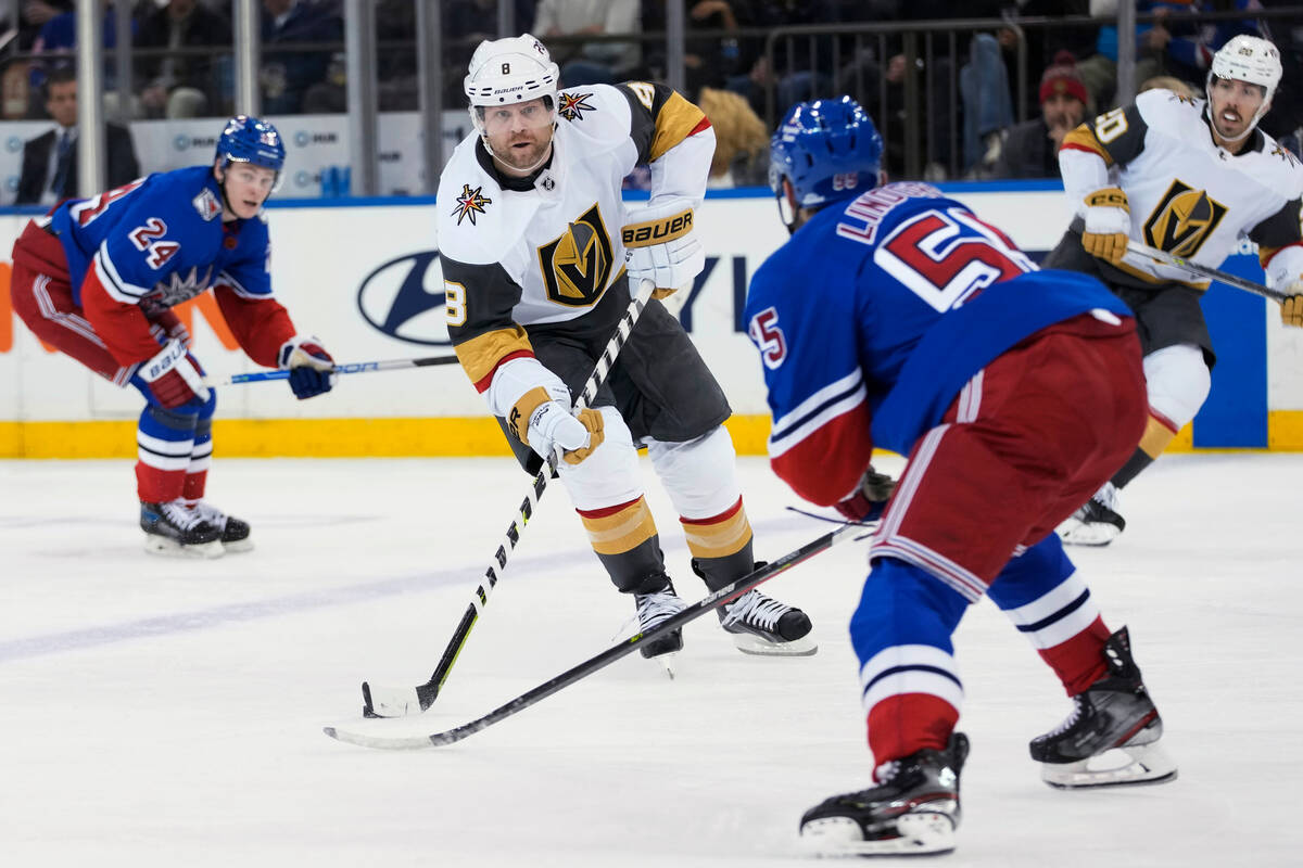 Vegas Golden Knights right wing Phil Kessel (8) skates against New York Rangers defenseman Ryan ...