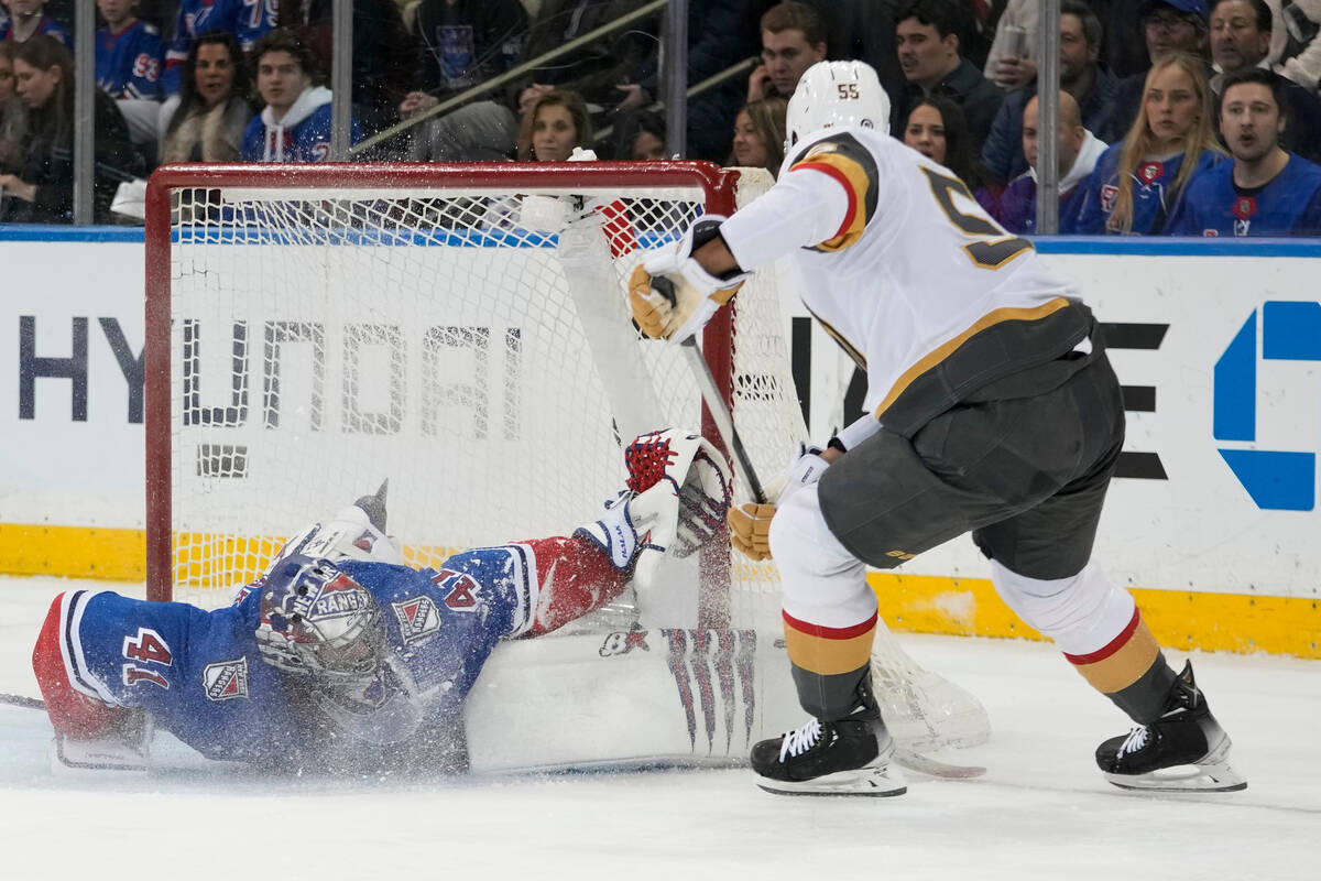 New York Rangers goaltender Jaroslav Halak (41) makes a save against Vegas Golden Knights right ...