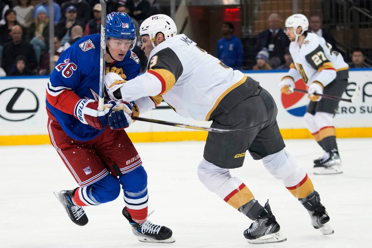 New York Rangers left wing Jimmy Vesey (26) skates against Vegas Golden Knights defenseman Bray ...