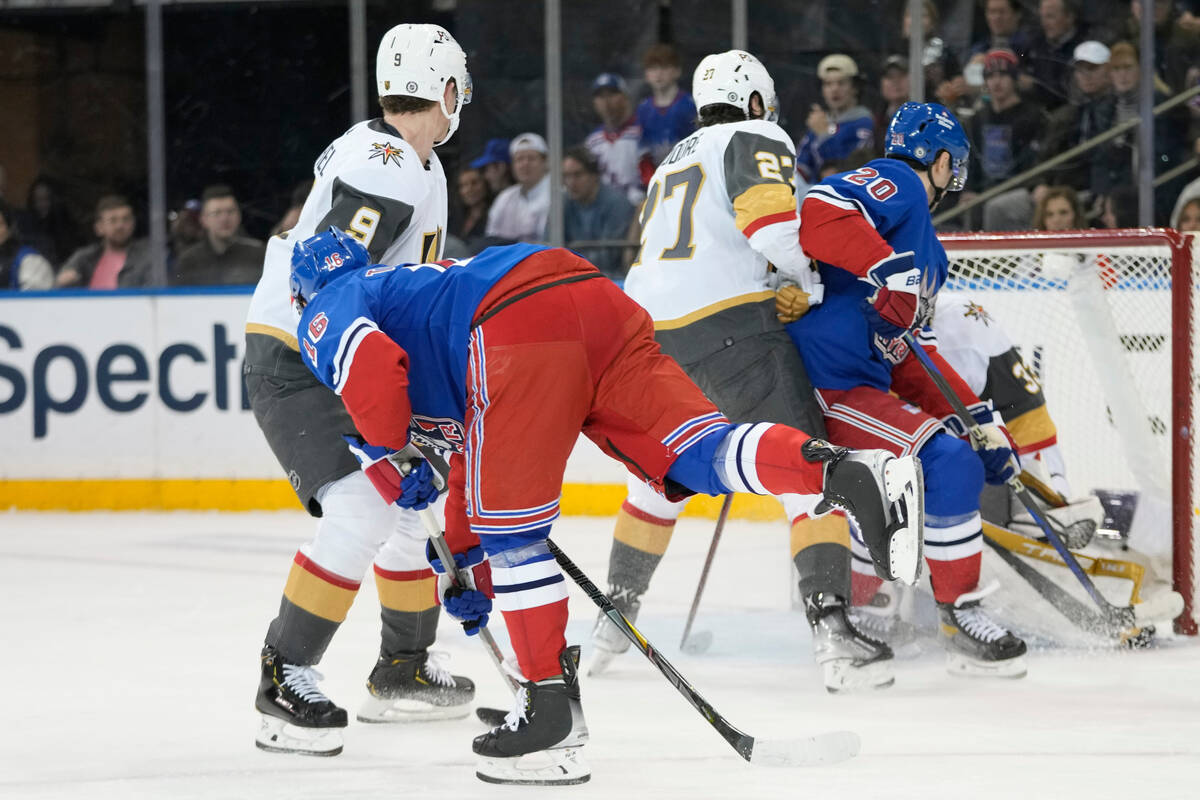 New York Rangers left wing Chris Kreider (20) scores a goal against the Vegas Golden Knights du ...