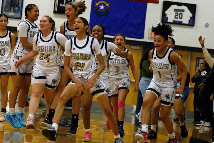 Spring Valley High School players including Charolette De Lisle (21) celebrate their ...
