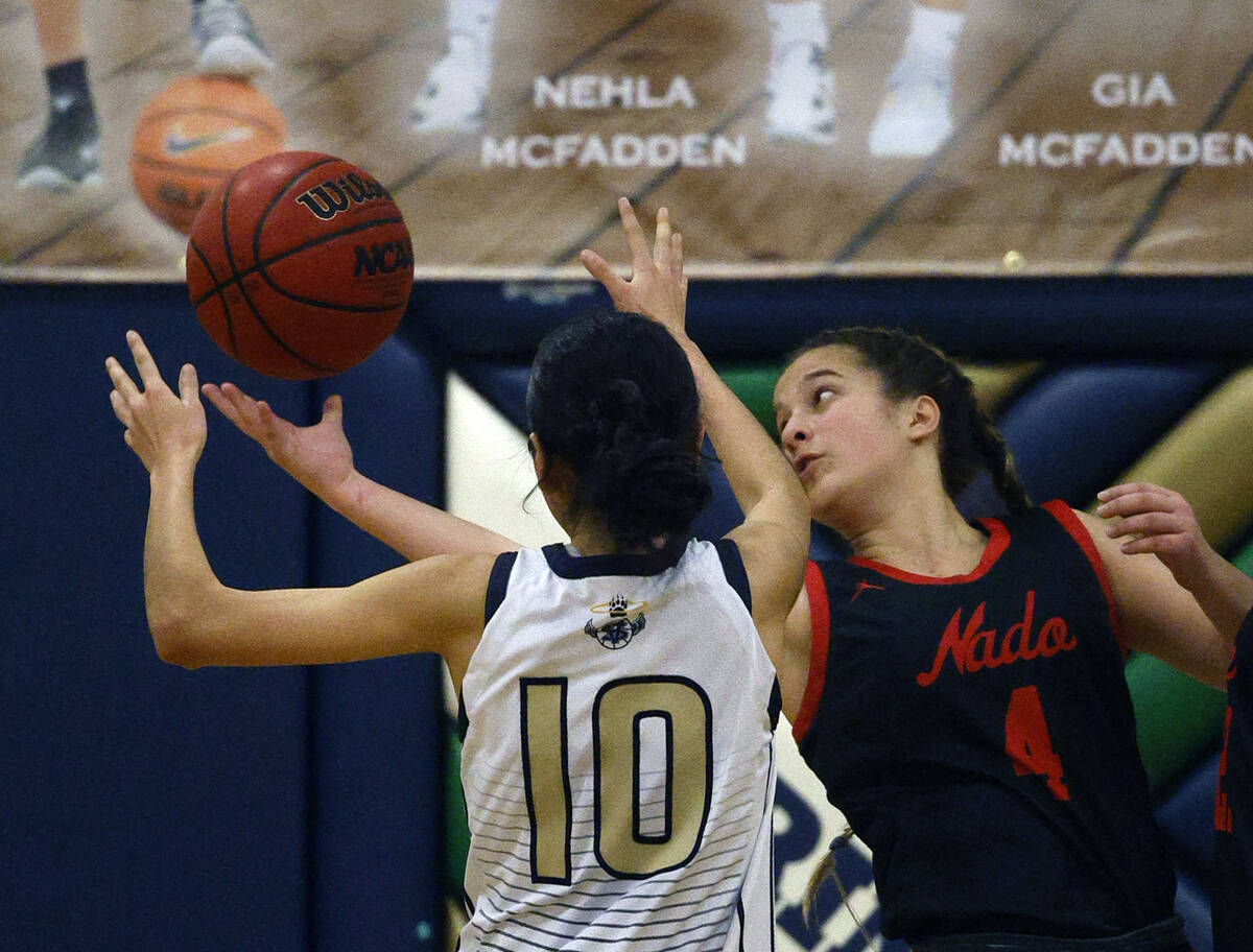 Spring Valley's Melanie Ortiz (10) and Coronado's Savannah Lopez (4) battle for a loose ball du ...