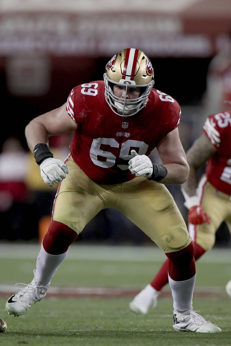 San Francisco 49ers offensive tackle Mike McGlinchey (69) blocks during an NFL divisional round ...