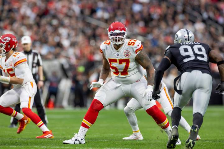 Kansas City Chiefs tackle Orlando Brown (57) blocks against the Las Vegas Raiders in an NFL foo ...